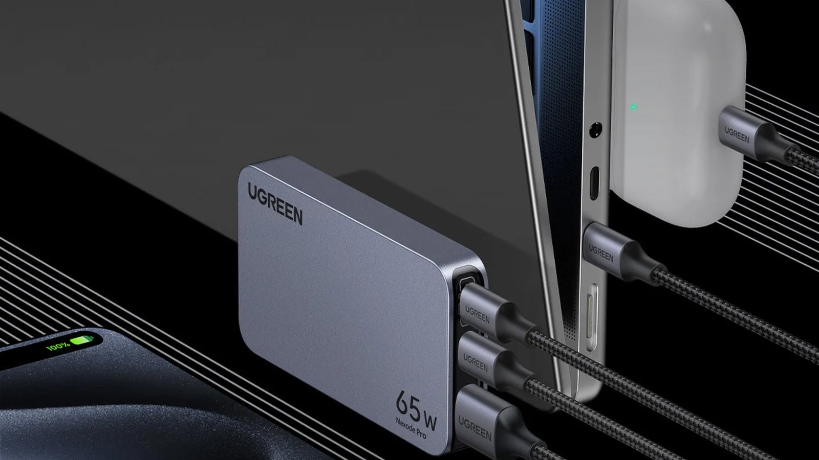 Best GaN charger winner 2026: UGREEN Nexode Pro 65W charging a laptop and a phone