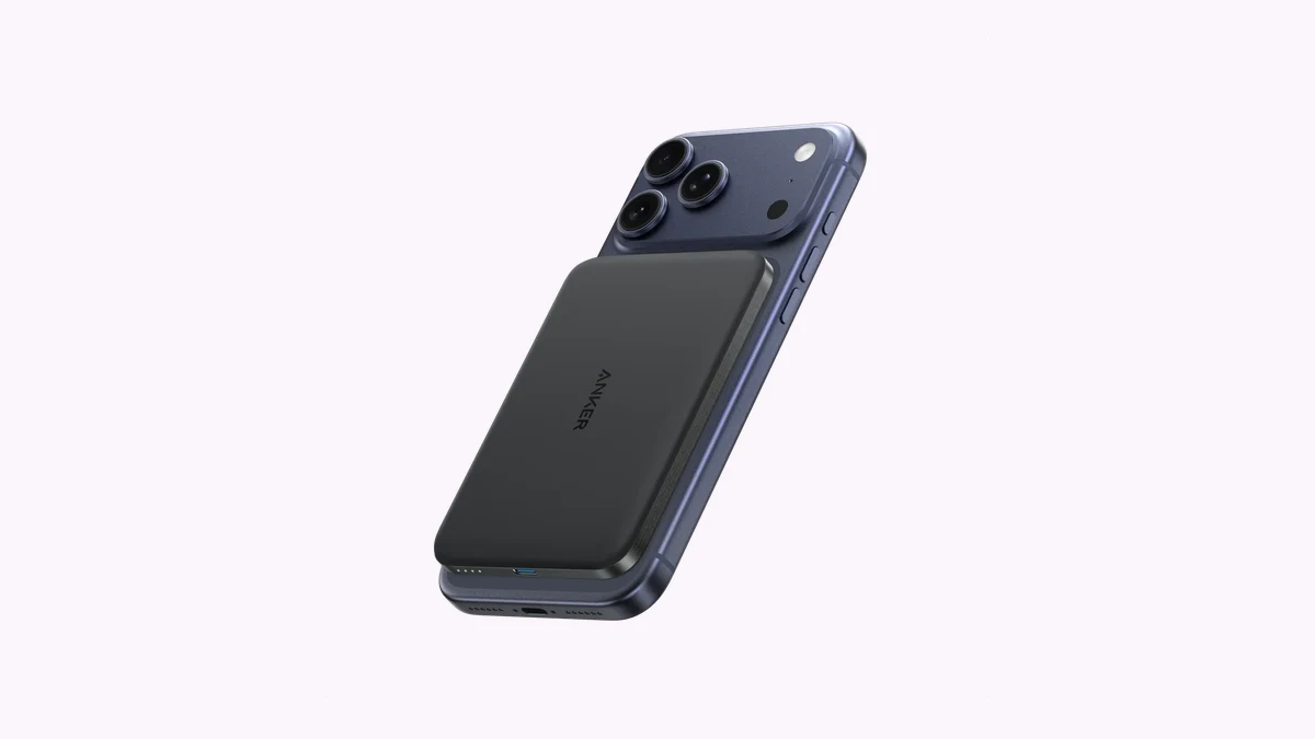 Anker Nano 5,000mAh MagSafe power bank attached to the back of an iPhone